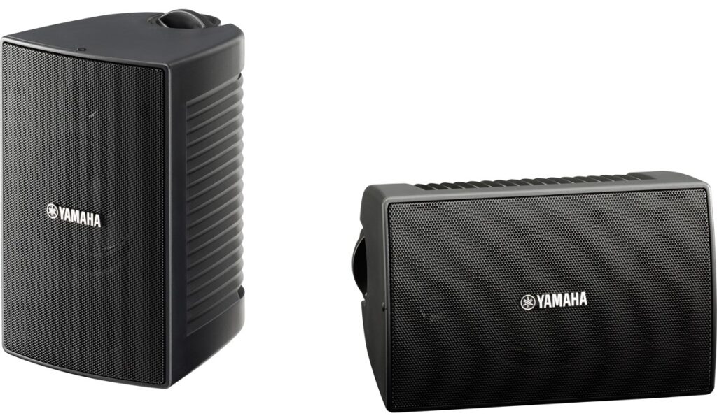 NS-AW194 A pair of small black speakers.